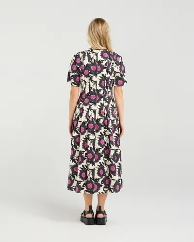 Model wearing Candy Blossom Vera Dress By Et Alia Available at Beetees Nelson